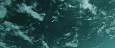 Liftoff into cyan sky